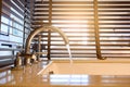 Close up ofÃÂ water flow from water tap into bathtub with wooden venetian blinds on background in bathroom